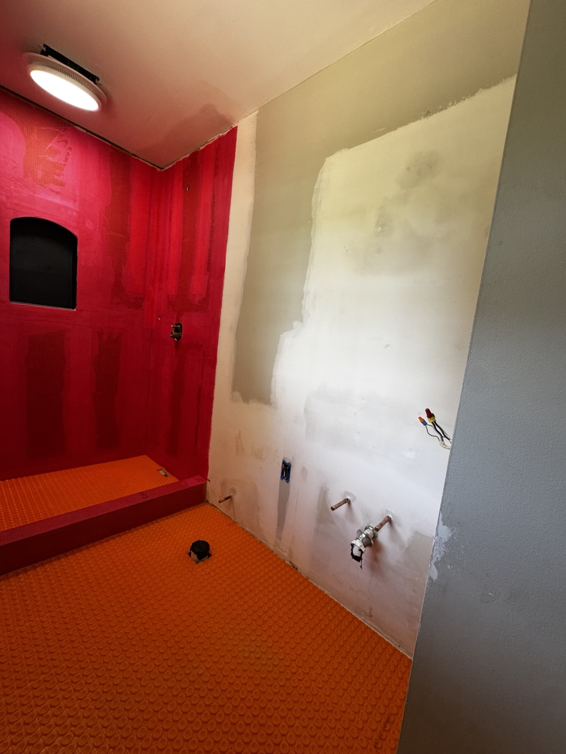 Bathroom shower and floor waterproofing during construction